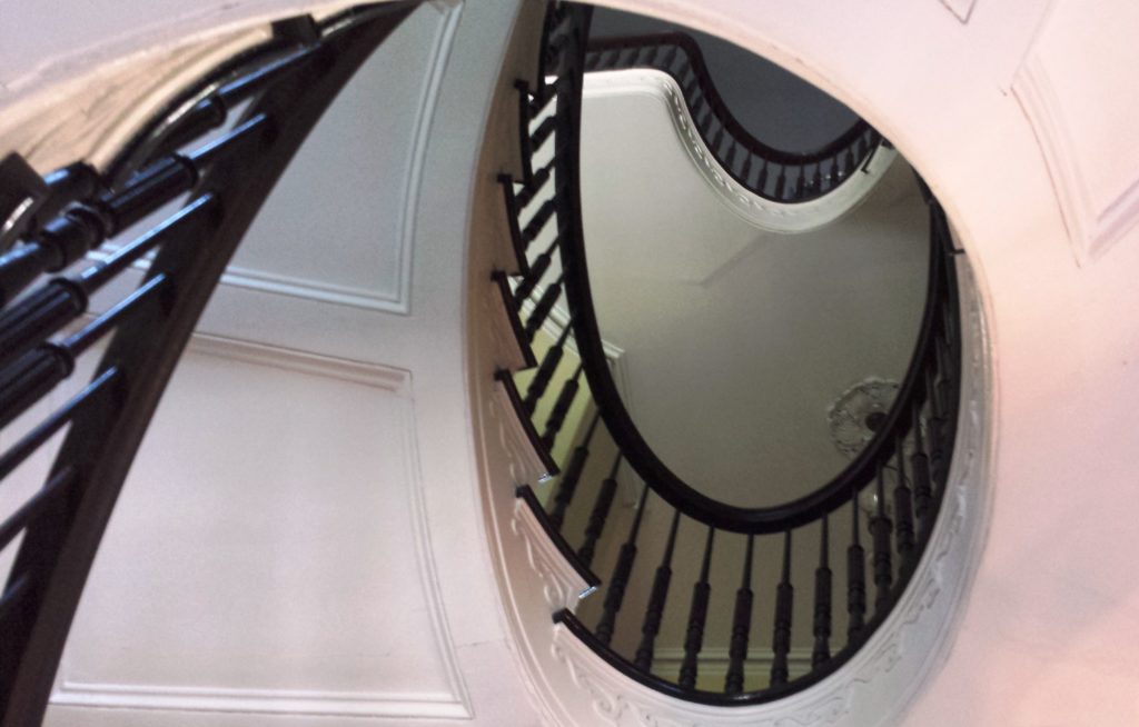 Spiral staircase in Greek Revival style architecture of early America at Bartow Pell
